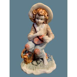 Vintage Hand-painted Porcelain Figurine of a Boy in a Hat 7"